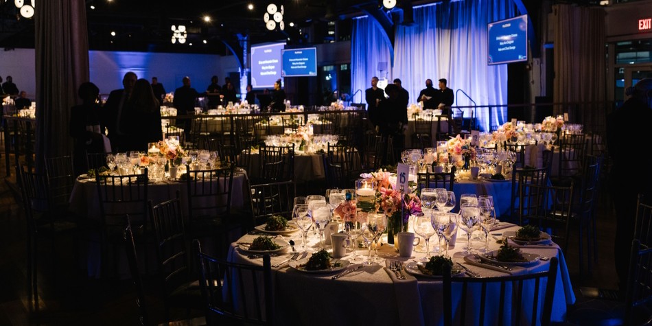 Pediatrics Benefit supporters in front of skyline