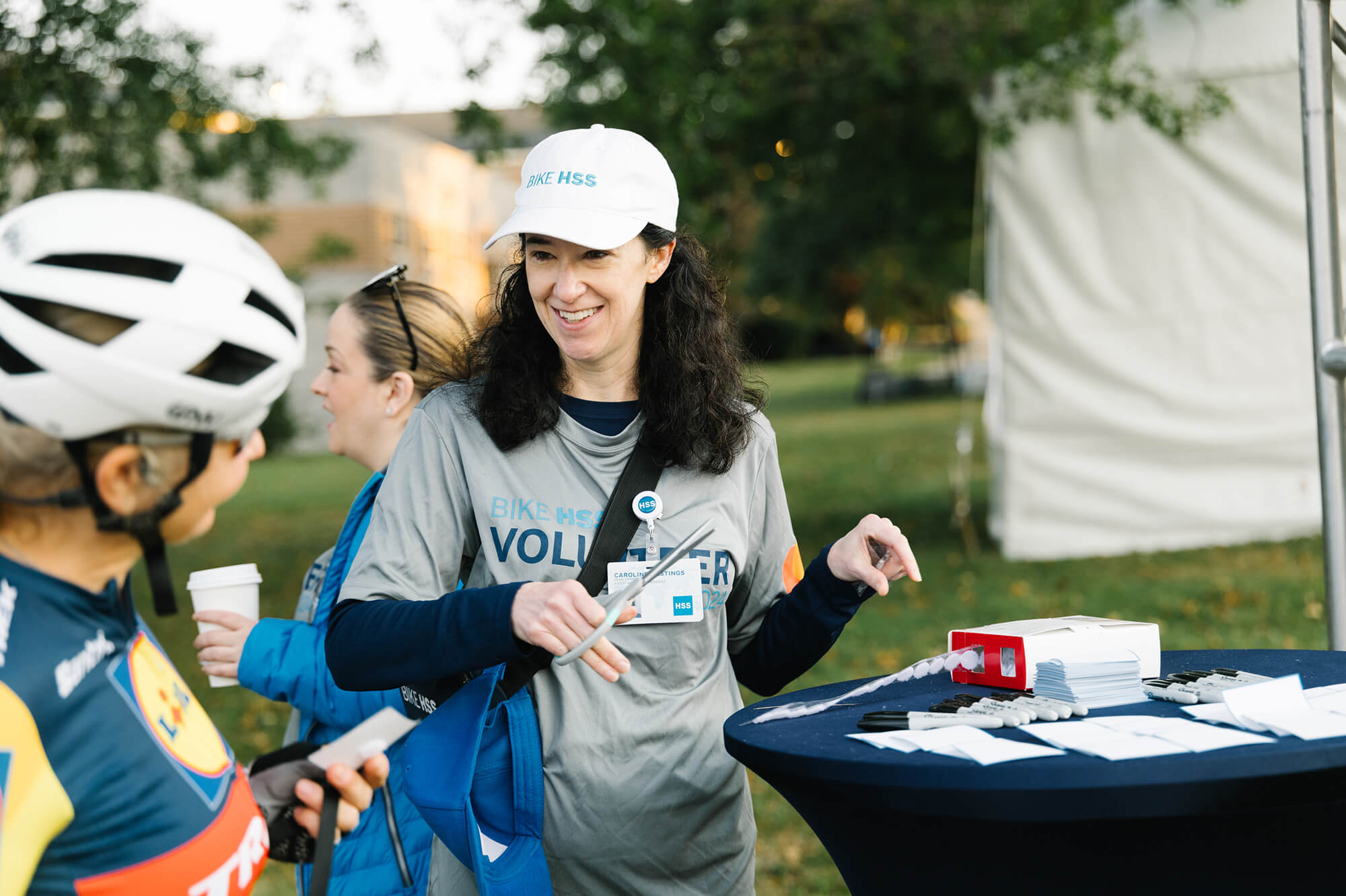 Bike HSS volunteer smiling at a rider